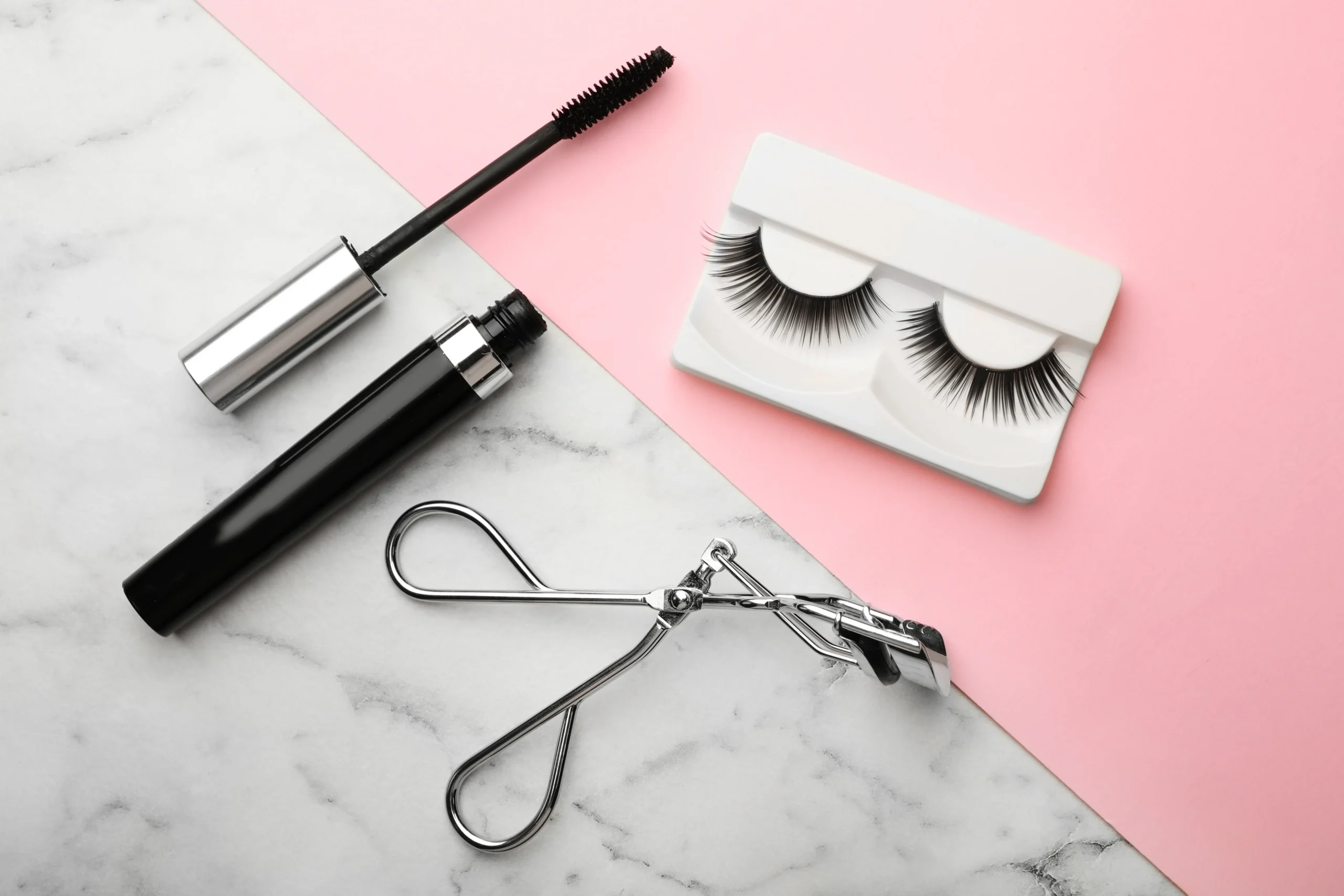 eyelash-enhancements-and-tools-on-a-pink-backgroun-2026-03-05-11-56-42-utc
