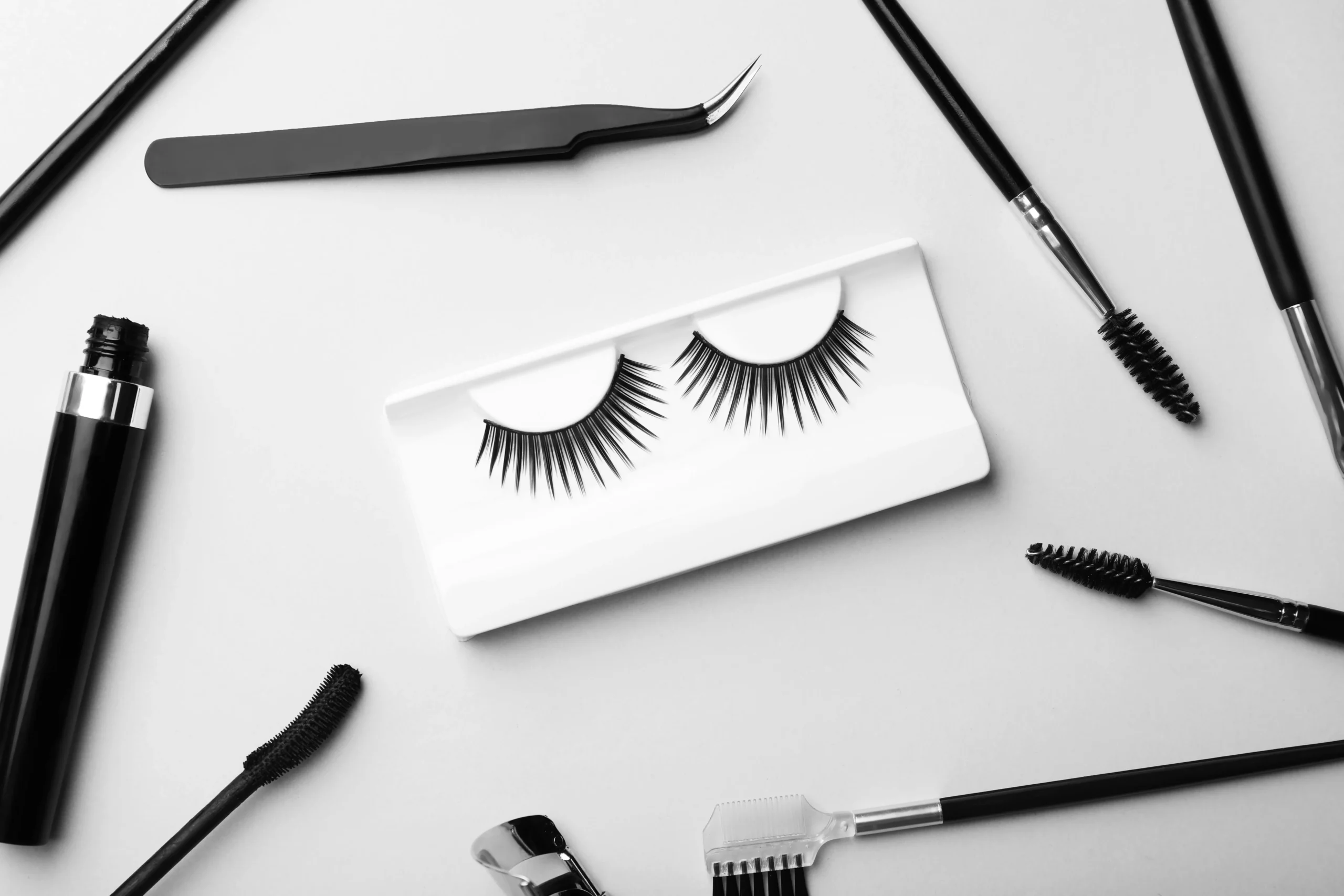 false-eyelashes-and-makeup-tools-on-white-2026-03-10-17-50-20-utc